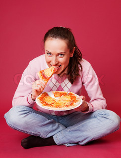 eatting pizza sitting on the floor