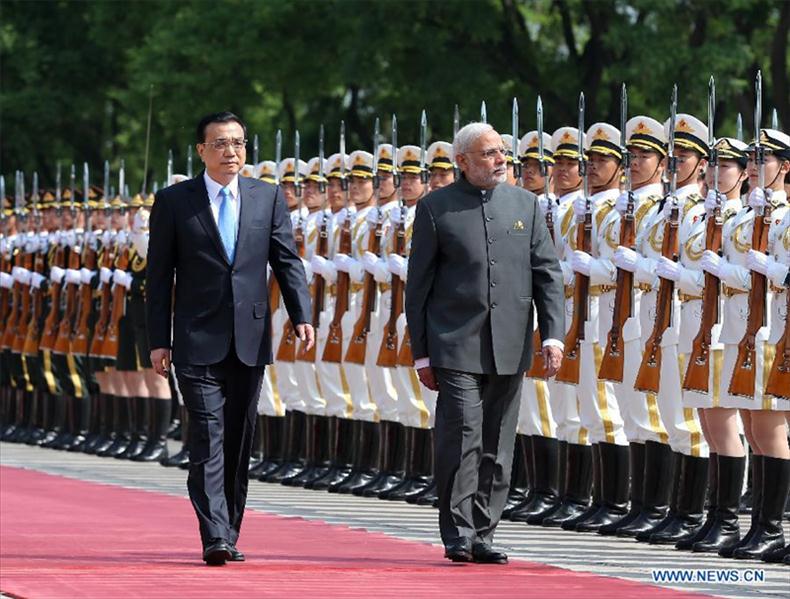 Chinese premier says talks with India’s Modi “meet expectations,” 24 deals signed