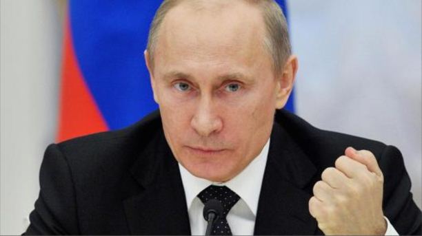Putin calls for Russians not to visit Turkey after plane downing