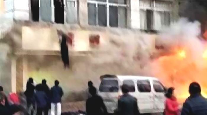 Eighteen killed in massage parlour fire in China