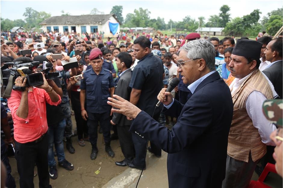 PM Deuba inspects flood-hit districts and distributes relief materials to victims